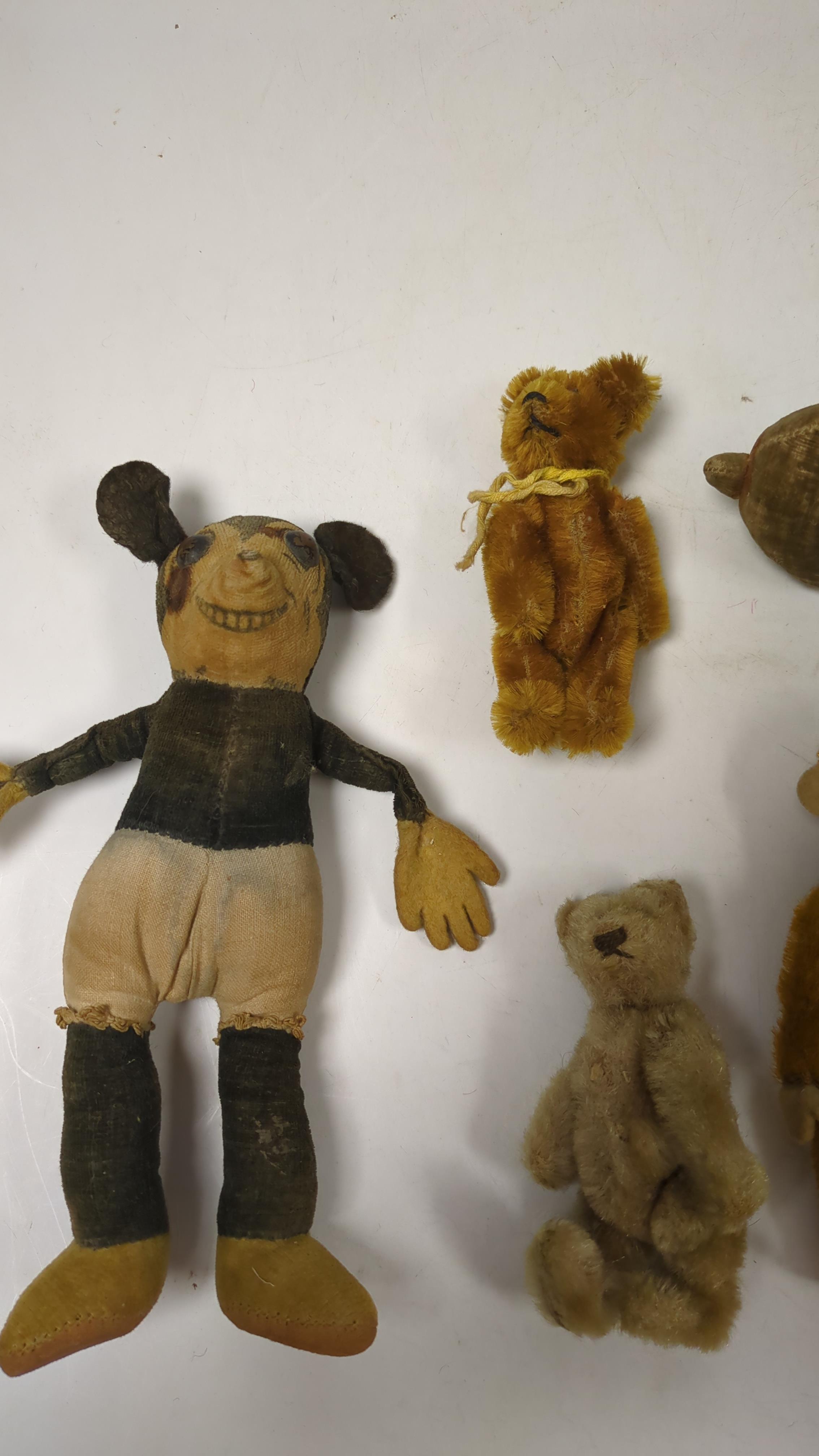 Deans Mickey Mouse and a group of Schuco and Schuco type toy animals (8)